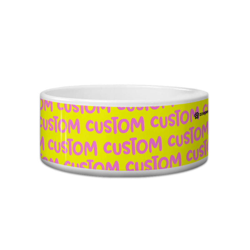 Customizable pet bowl with yellow background and pink text on a white background