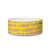 Customizable pet bowl with yellow background and pink text on a white background