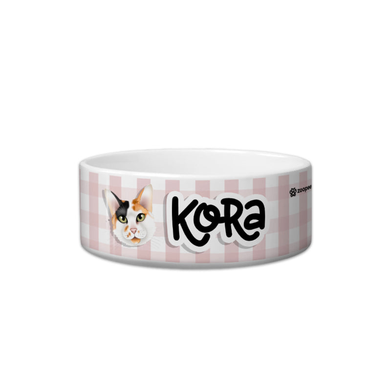 Cat food bowl with 'Kora' and a cat's face on a white background